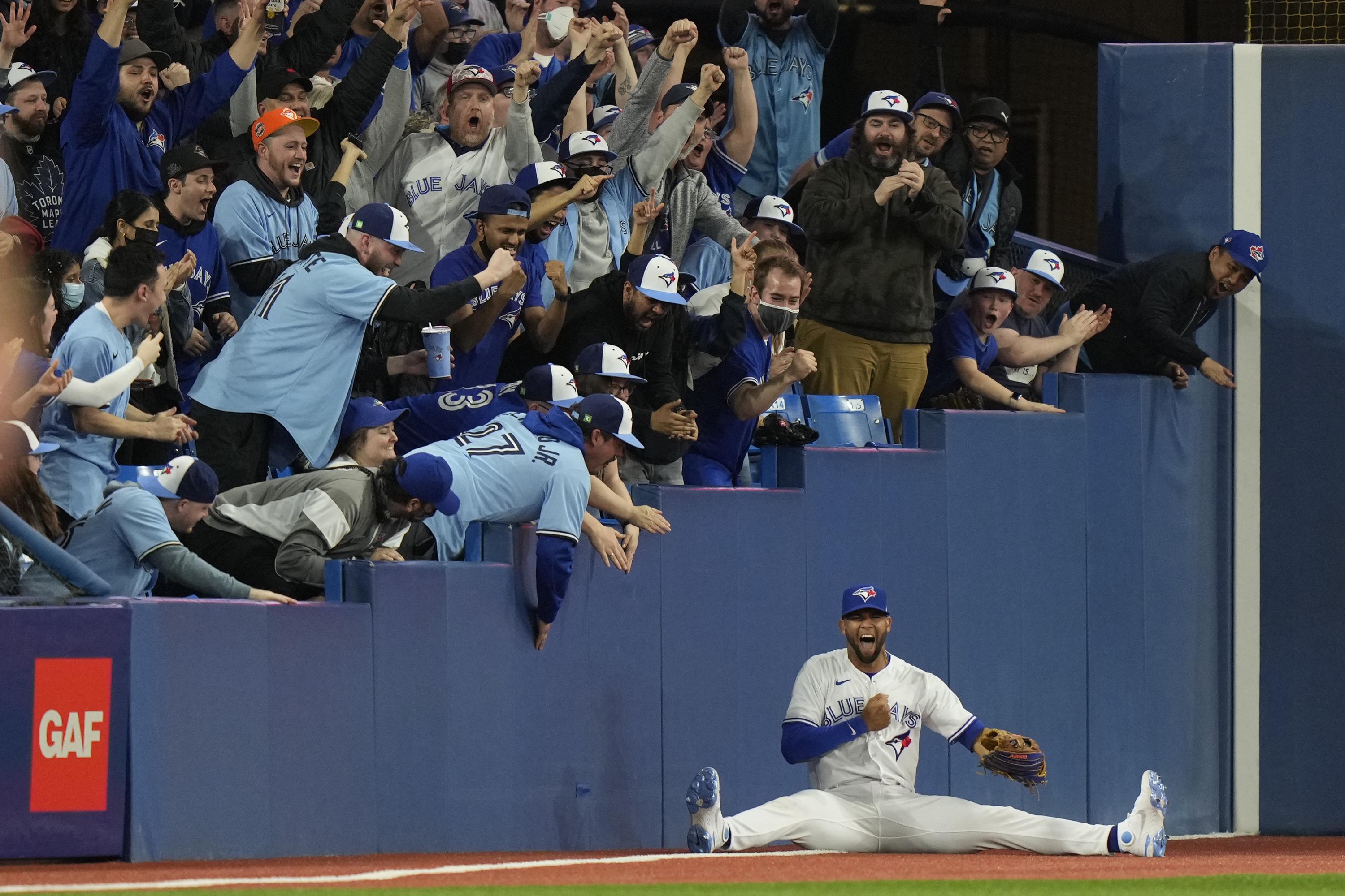 Jays rally from 7 down for season-opening win over Rangers