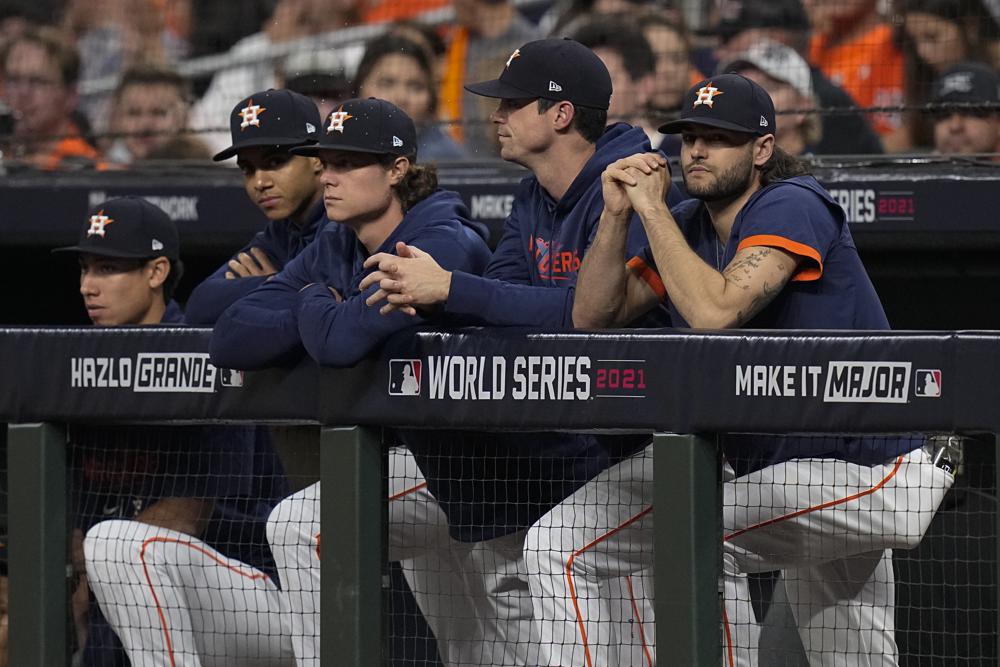 Members of the Houston Astros watch during the seventh inning in Game 6 of baseball's World Series between the Houston Astros and the Atlanta Braves Tuesday, Nov. 2, 2021, in Houston. (AP Photo/Eric Gay)