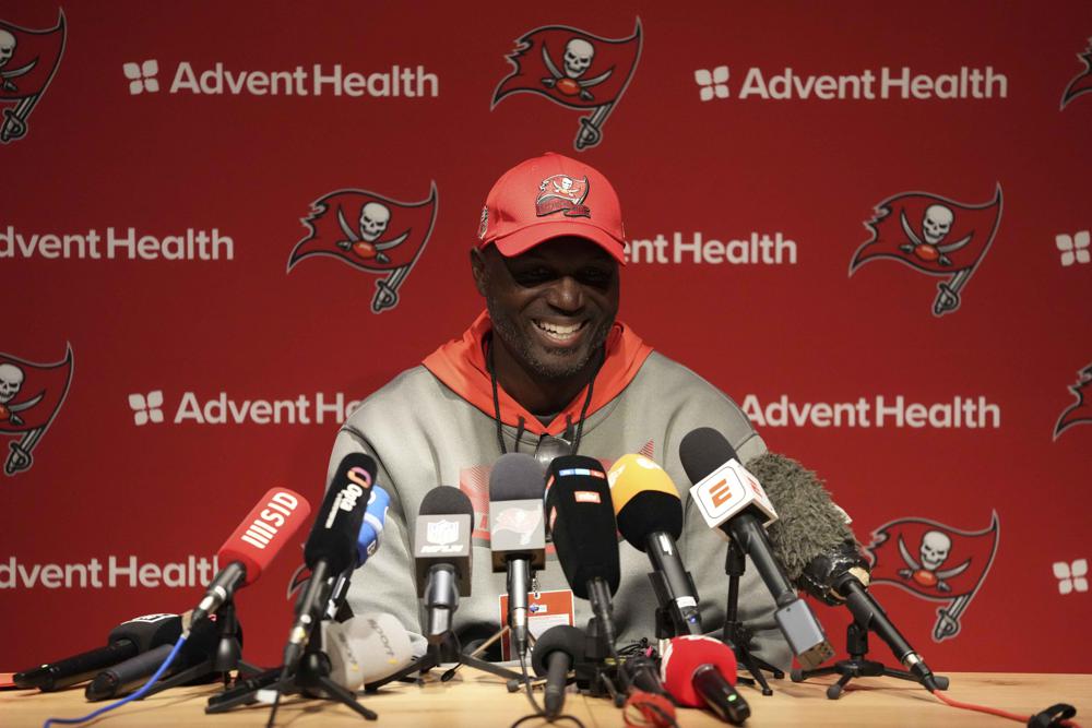 Tampa Bay Buccaneers head coach Todd Bowles attends a news conference after a practice session in Munich, Germany, Friday, Nov. 11, 2022. The Tampa Bay Buccaneers are set to play the Seattle Seahawks in an NFL game at the Allianz Arena in Munich on Sunday. (AP Photo/Matthias Schrader)