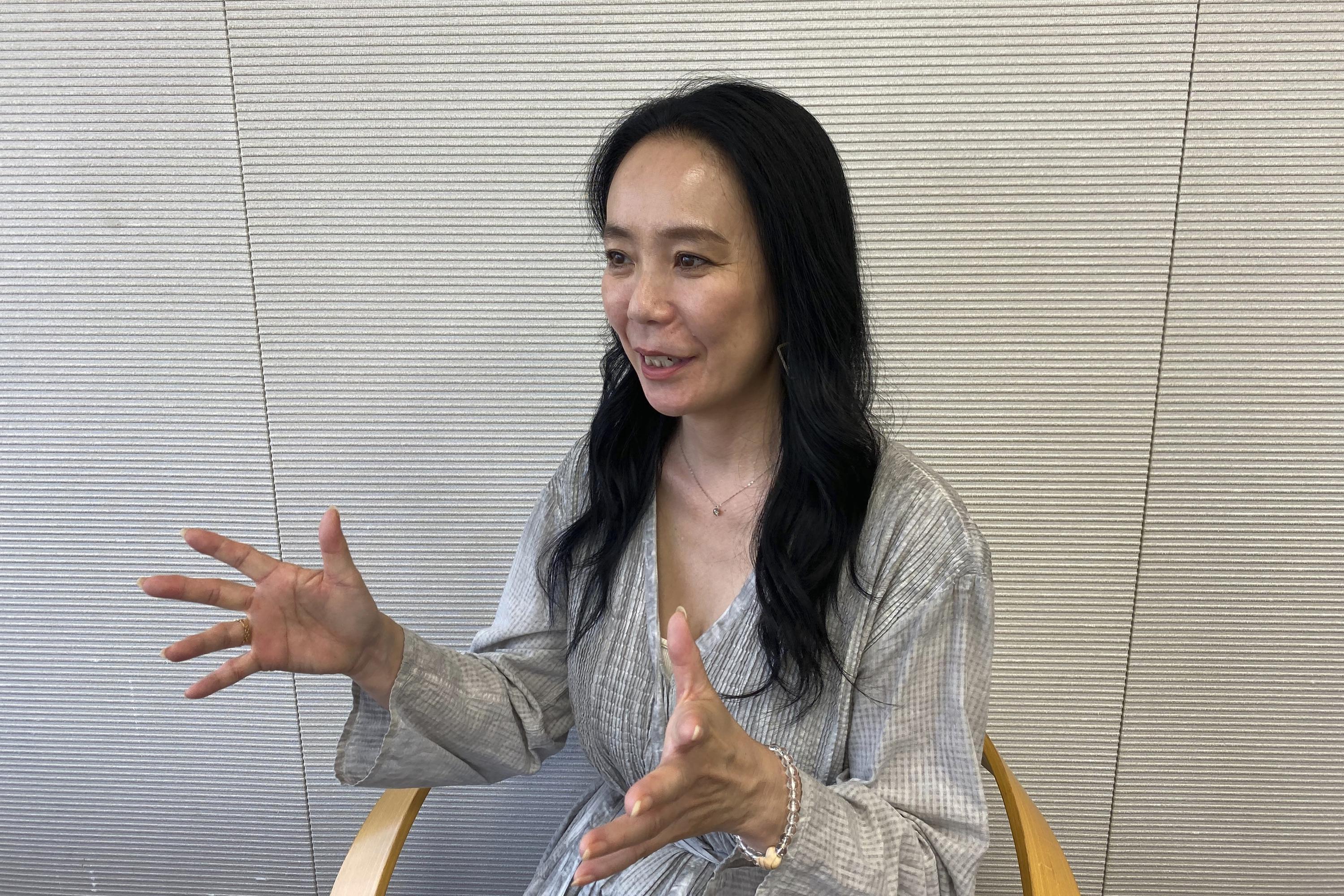 Olympic filmmaker needed 2 movies to cover Tokyo turmoil | AP News