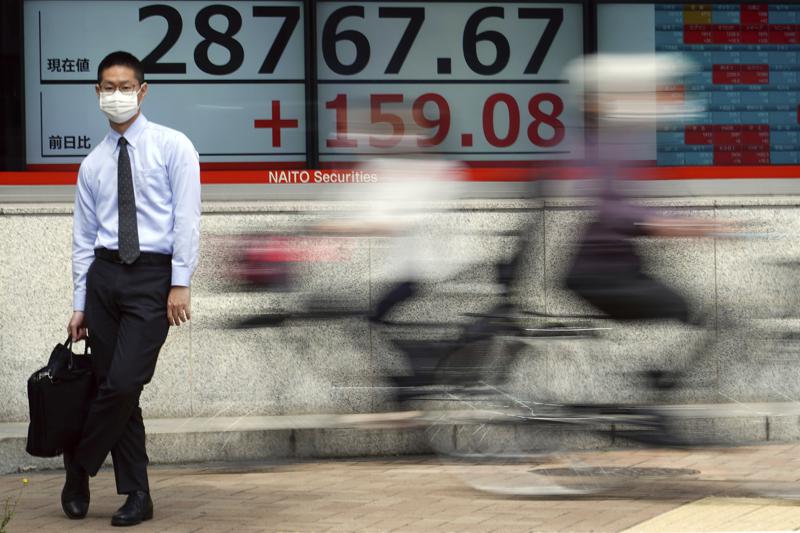 Asian stocks mixed after Wall St falls on inflation fears