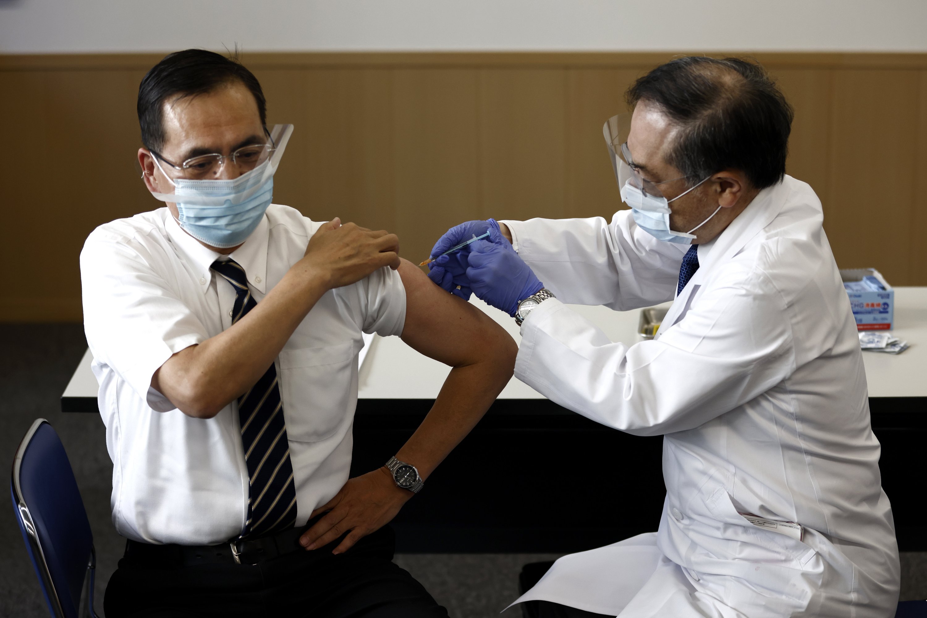 Japan begins COVID-19 vaccination process amid Olympic concerns