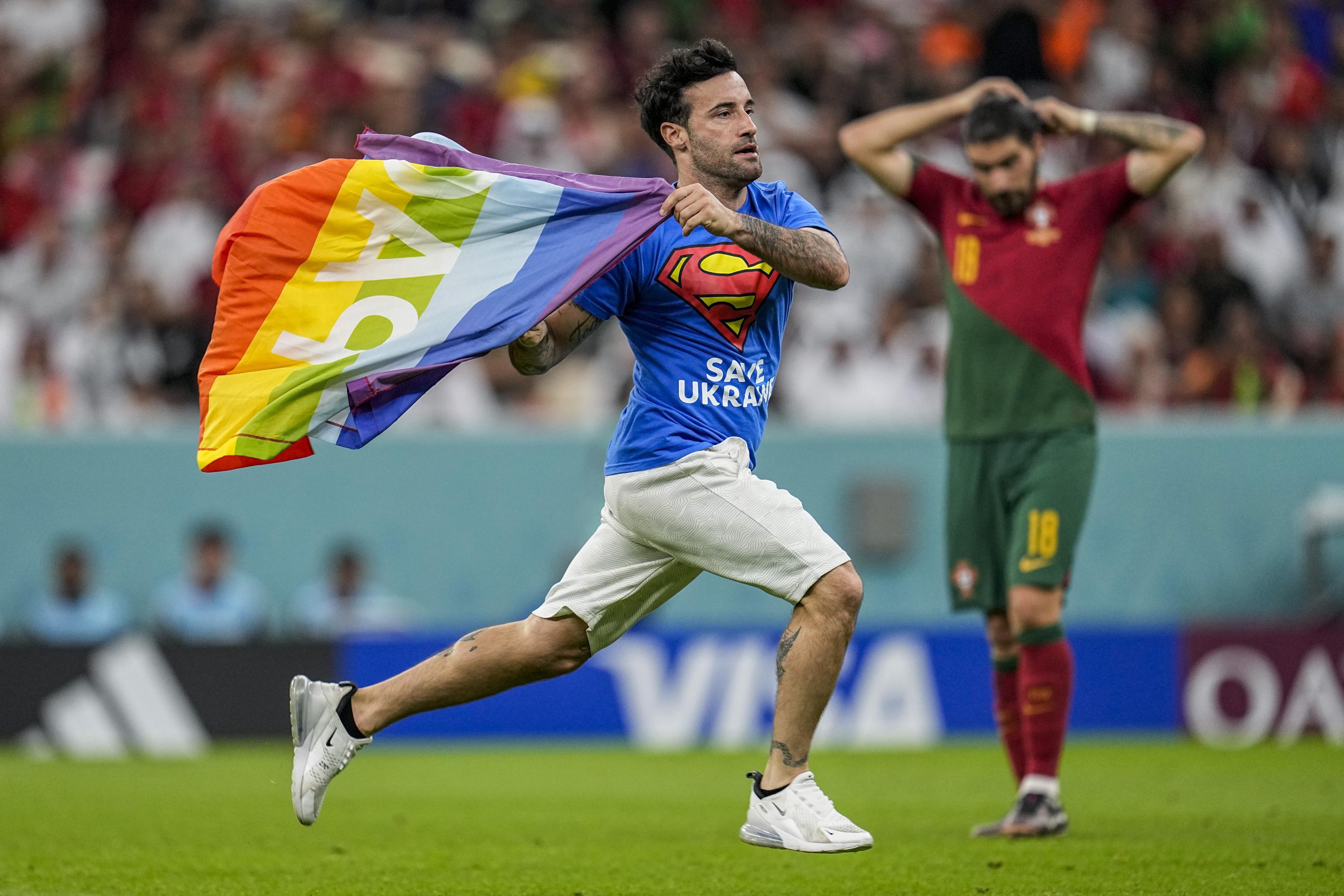 Protester with rainbow flag banned from World Cup matches