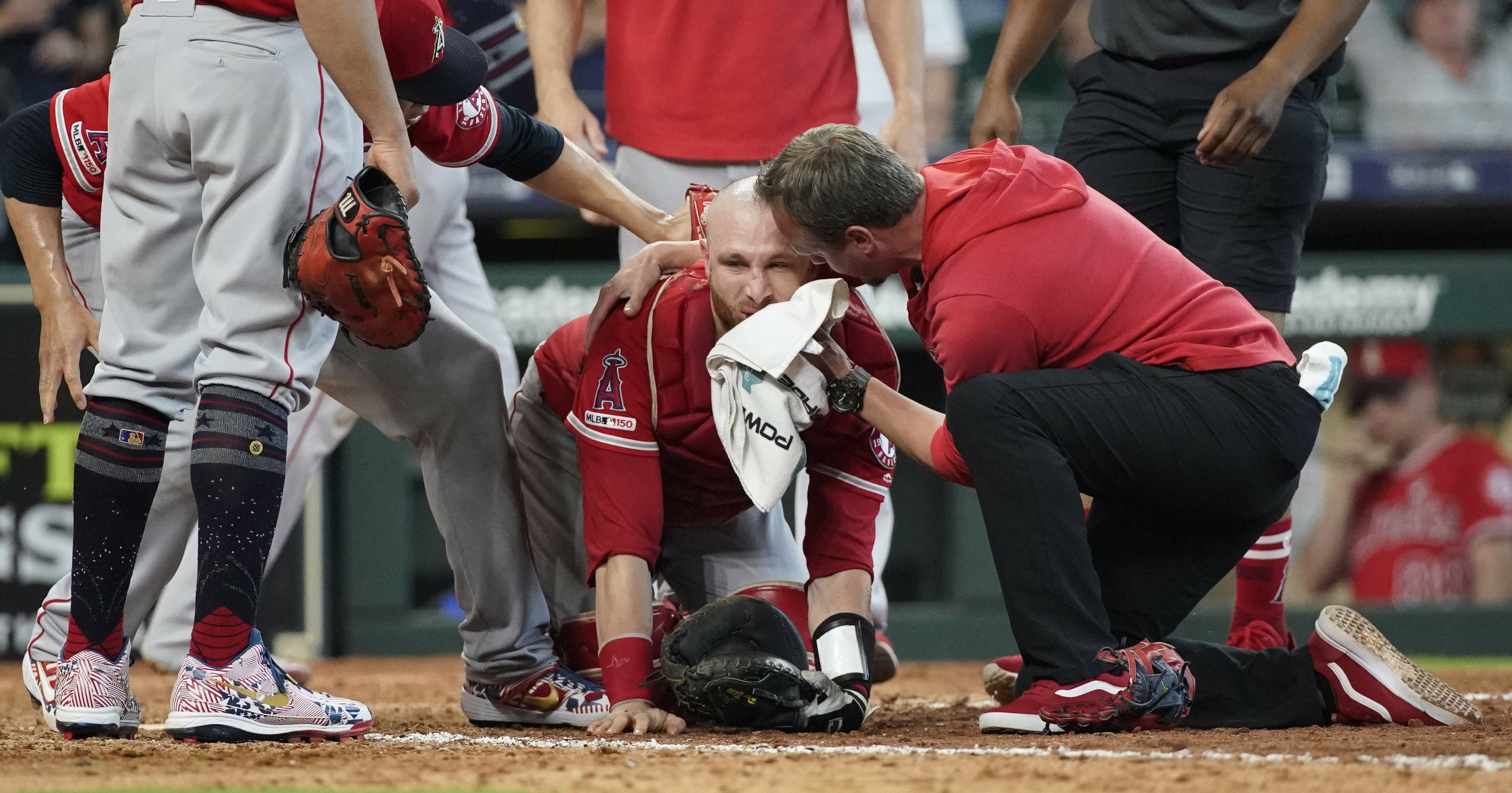 Angels' Lucroy carted off, hospitalized after collision AP News