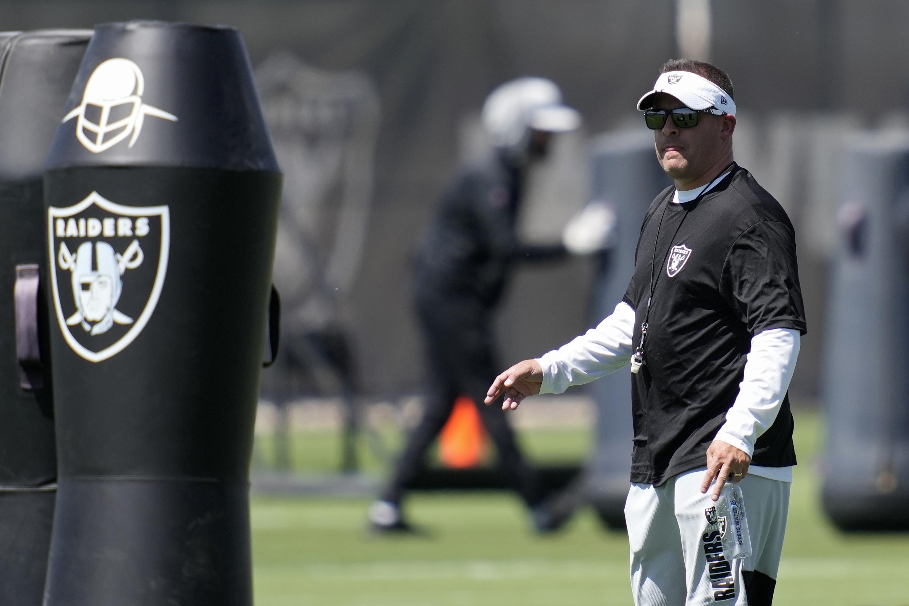 McDaniels remains patient as Carr, offense learn new system | AP News