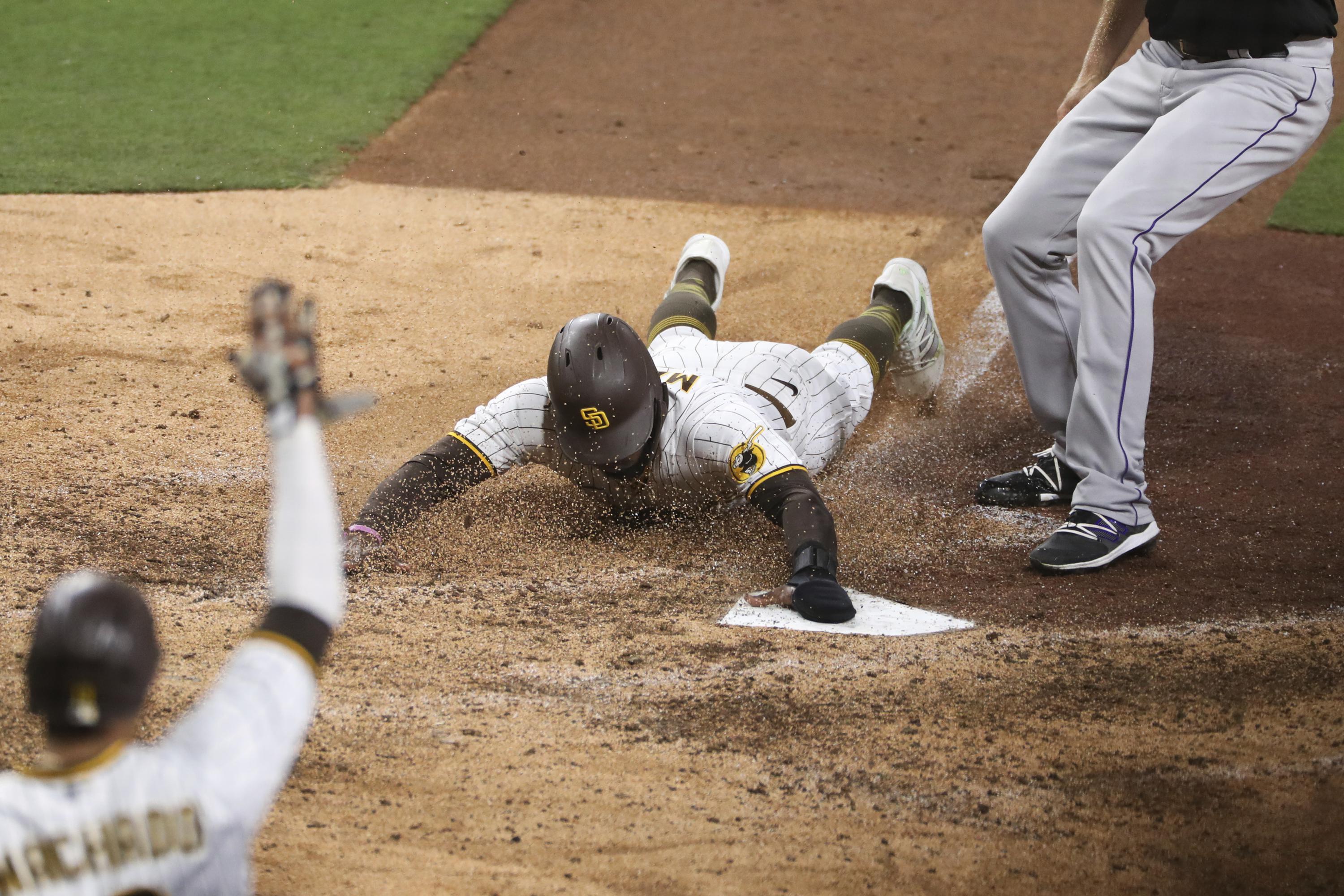 Padres Score On Wild Pitch To Beat Rockies 2 1 In 10 Innings