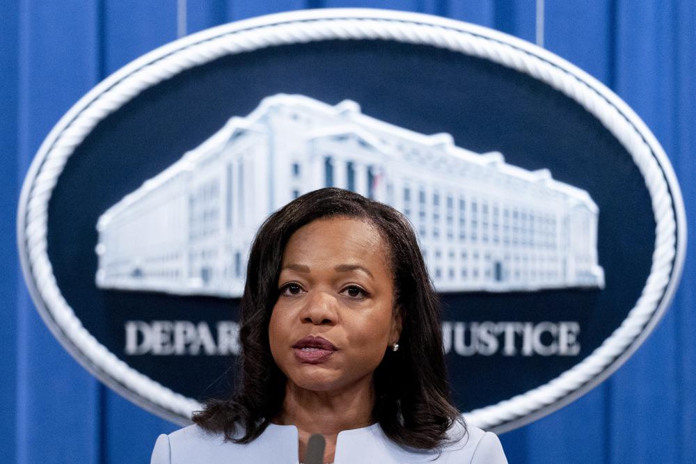 FILE - In this Aug. 5, 2021 file photo, Assistant Attorney General for Civil Rights Kristen Clarke speaks at a news conference at the Department of Justice in Washington.  The U.S. Department of Justice on Tuesday announced a statewide civil rights investigation into Georgia prisons.  Clarke, who oversees the department's civil rights division, said the investigation will be comprehensive but will focus on “harm to prisoners resulting from prisoner-on-prisoner violence.”  (AP Photo/Andrew Harnik)