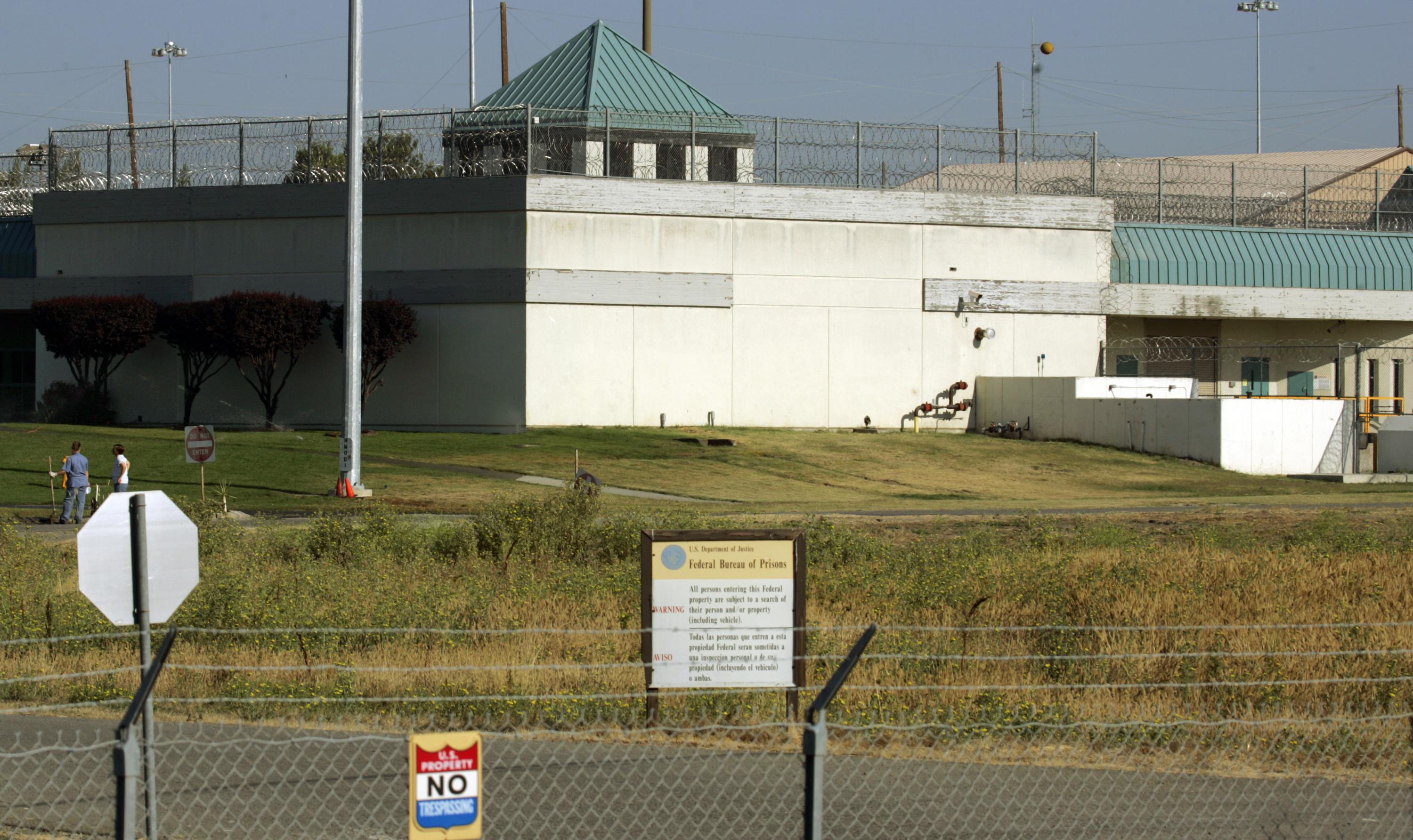 Behind a closed chapel office door inside a federal women’s prison in Calif...