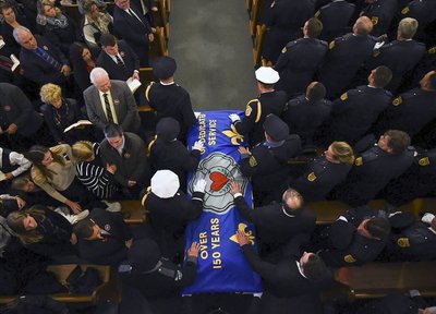 Hundreds Crowd Funeral For Firefighter Who Saved Colleagues