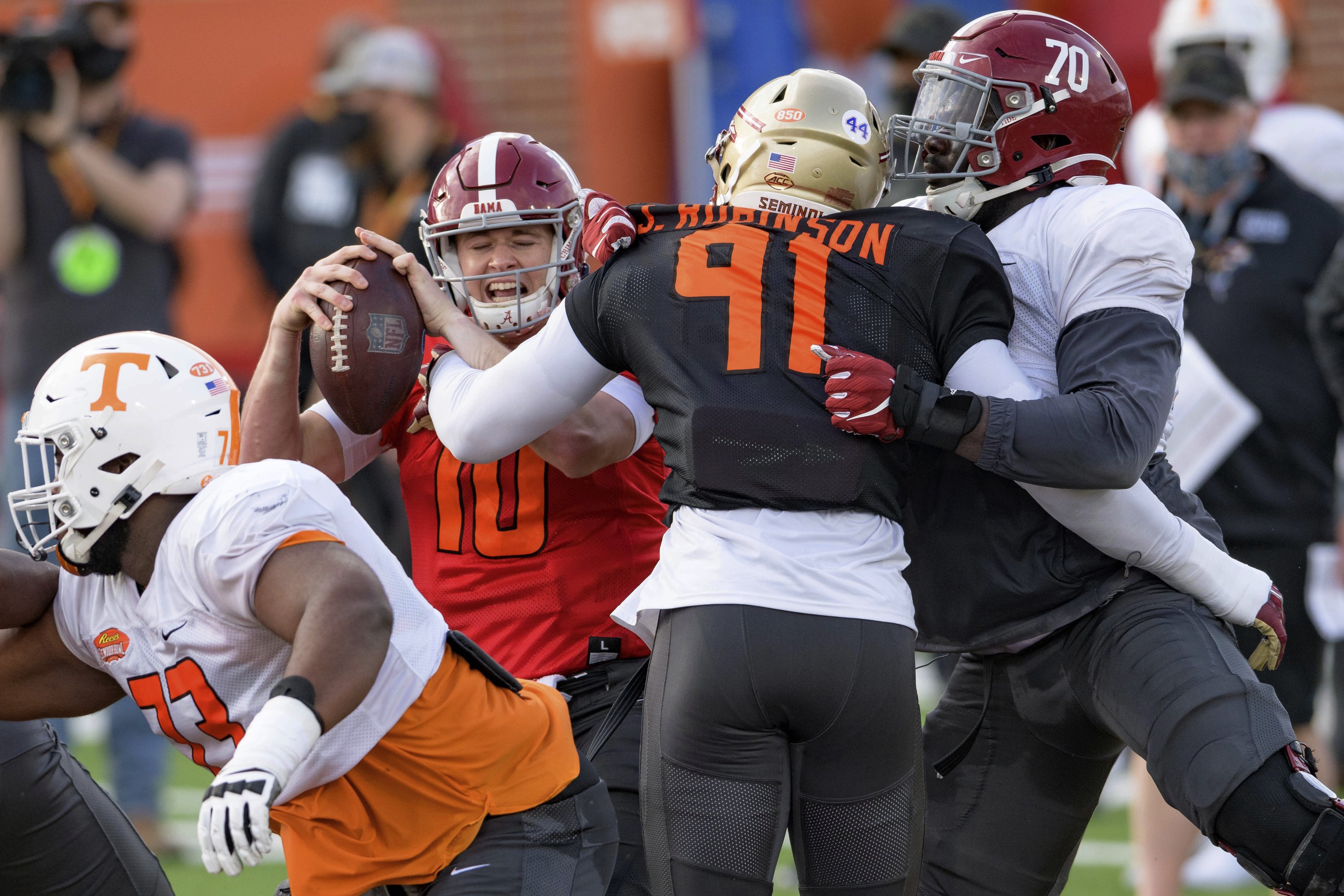 Alabama's Mac Jones sustains ankle injury at Senior Bowl AP News