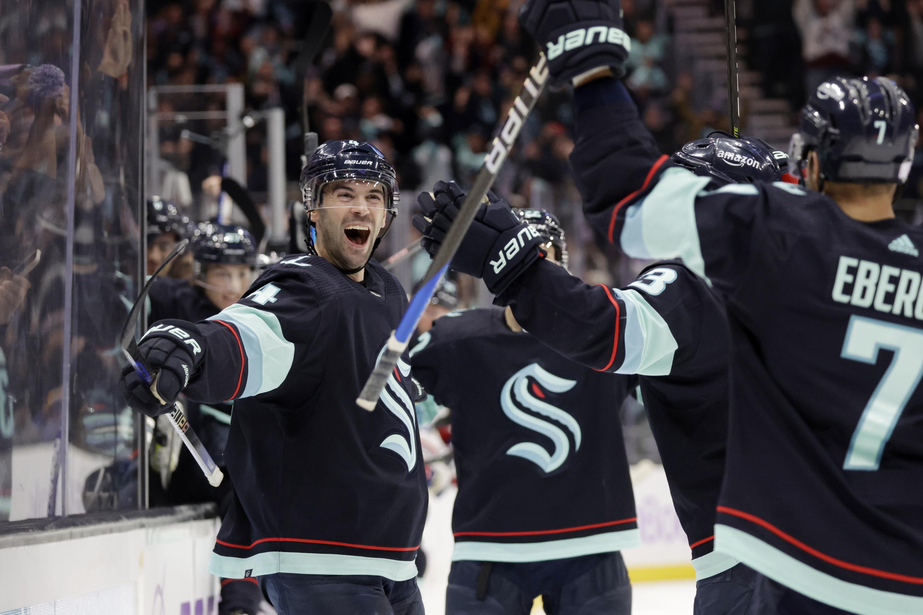 Schultz scores 2, leads Kraken to 3-2 OT win over Rangers AP News