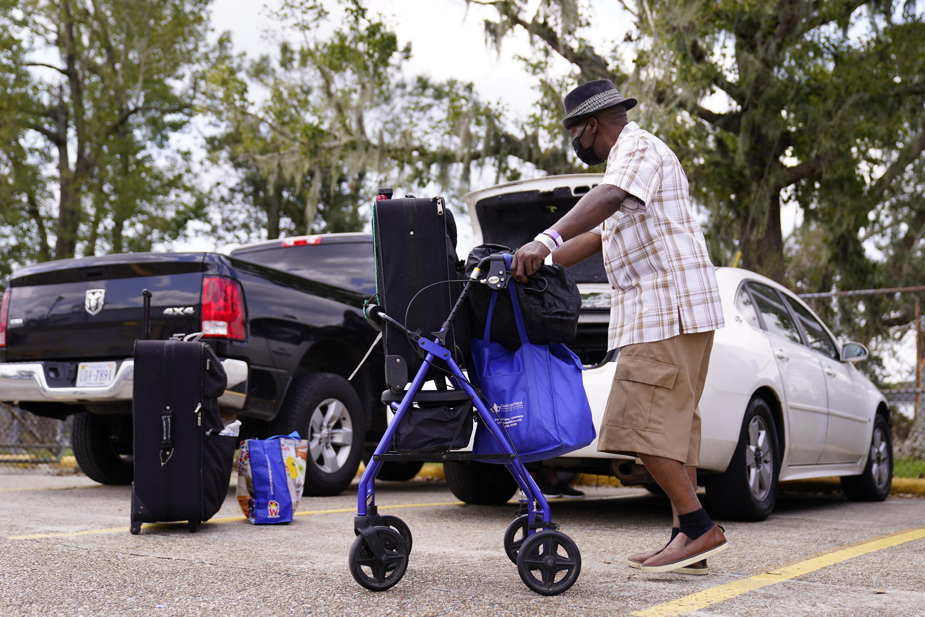 Extended power outages push Louisiana residents to leave AP News