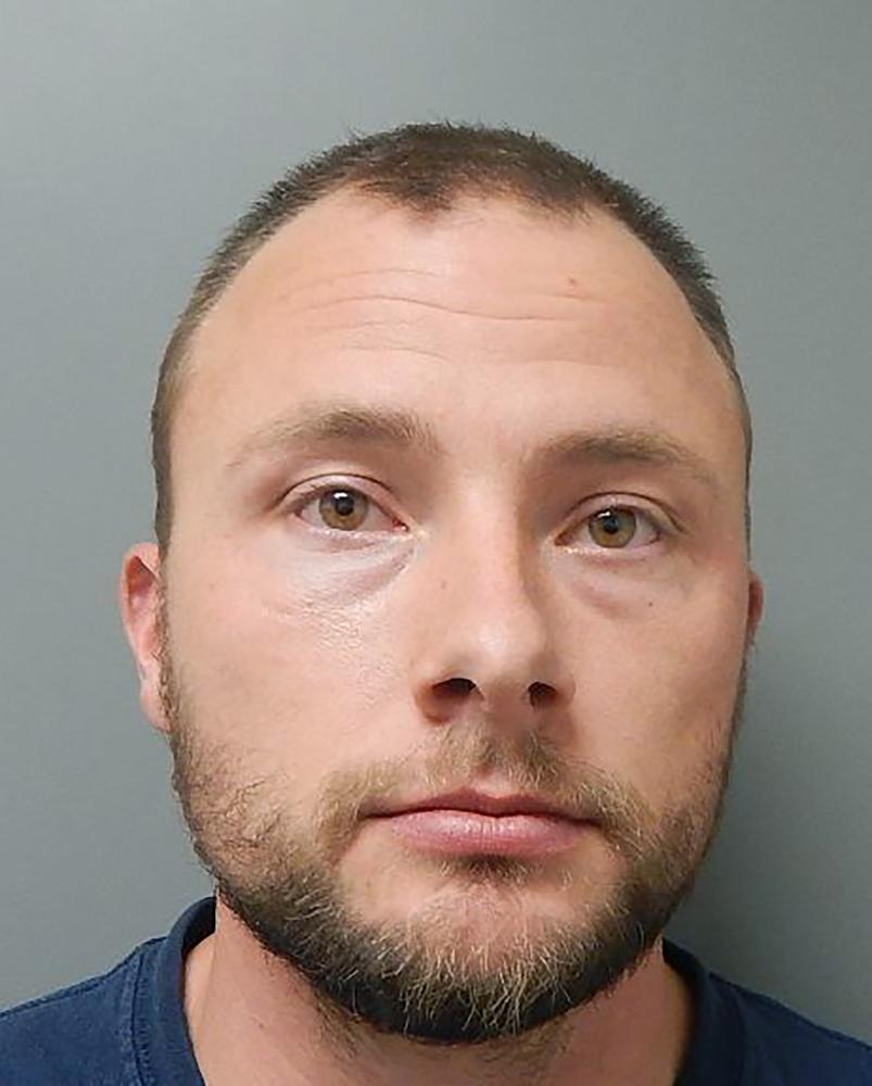 This Dec. 10, 2020, photo, provided by the Ouachita Parish Sheriff’s Office shows Louisiana State Police Trooper Jacob Brown. Graphic body camera video kept secret for more than two years shows Brown pummeling a Black motorist 18 times with a flashlight, an attack Brown defended as “pain compliance.” (Ouachita Parish Sheriff’s Office via AP)