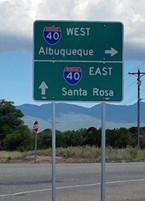 This photo provided by the New Mexico Department of Transportation shows a misspelled sign in New Mexico. A newly upgraded state Department of Transportation sign erected last week that pointed drivers toward Albuquerque misspelled the city's name, losing the “R.” (New Mexico Department of Transportation via AP)