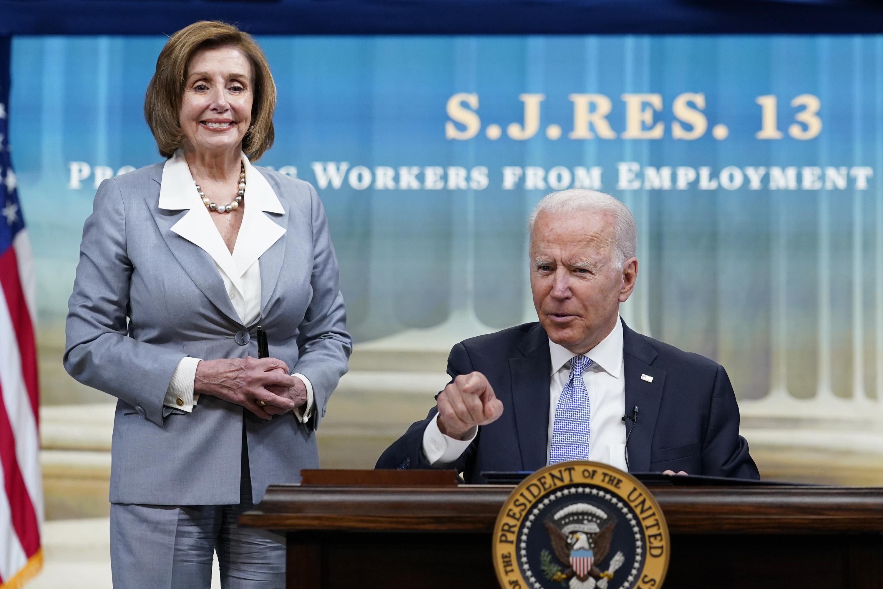 Biden signs three bills to overturn Trumpera rules AP News