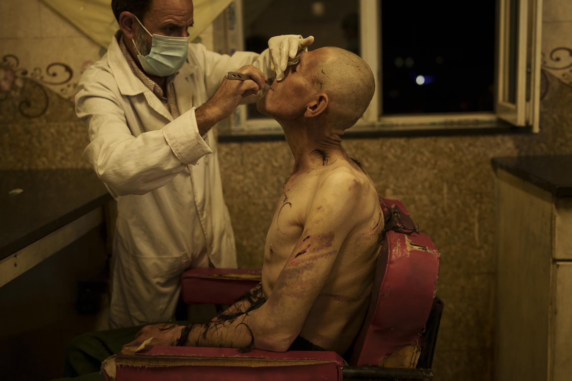 Taliban invokes Islam to weed out drugs from Afghanistan war begins with shaved heads for addicts