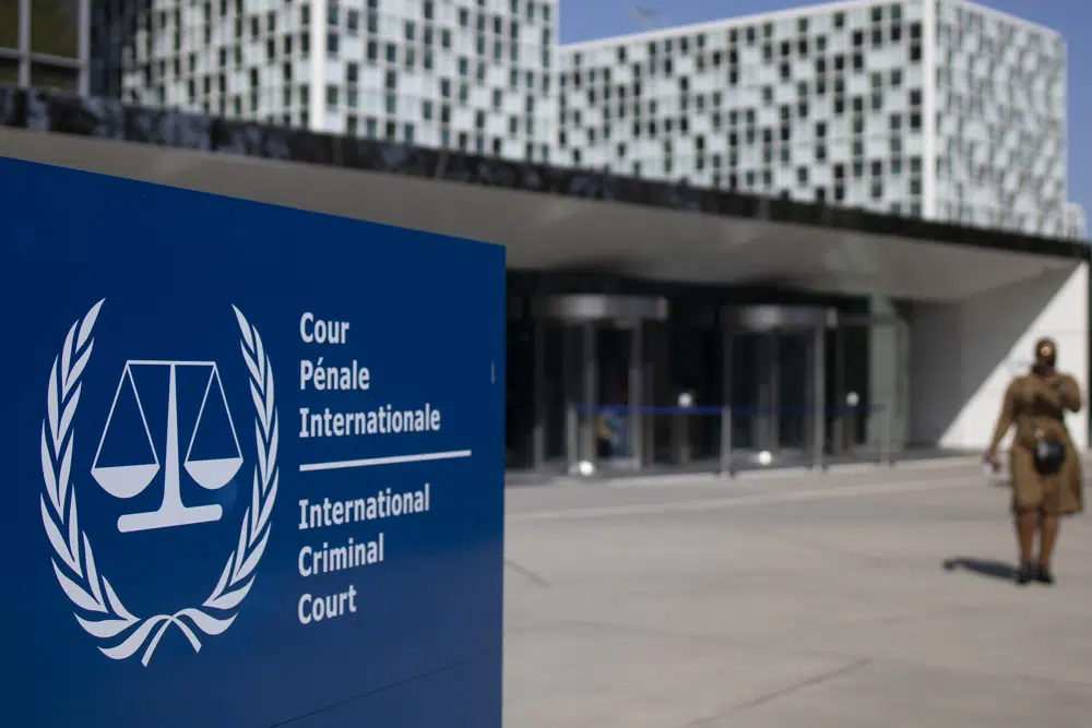 FILE - The exterior view of the International Criminal Court are pictured in The Hague, Netherlands, Wednesday, March 31, 2021. The International Criminal Court said Friday, March 17, 2023 it has issued an arrest warrant for Russian President Vladimir Putin for war crimes because of his alleged involvement in abductions of children from Ukraine. (AP Photo/Peter Dejong, File)