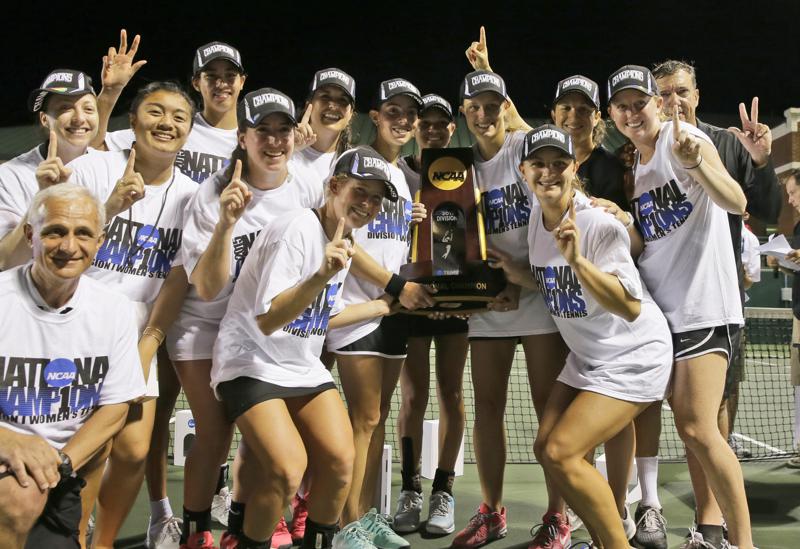 FILE - Vanderbilt posses with the trophy after their team won the NCAA's women's team tennis championships against Oklahoma, Tuesday, May 19, 2015, Waco, Texas. The number of women competing at the highest level of college athletics continues to rise along with an increasing funding gap between men’s and women’s sports programs, according to an NCAA report examining the 50th anniversary of Title IX. (AP Photo/LM Otero, File)