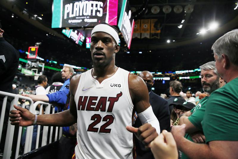 Miami Heat's Jimmy Butler leaves the court after the team's win over the Boston Celtics during Game 6 of the NBA basketball playoffs Eastern Conference finals Friday, May 27, 2022, in Boston. (AP Photo/Michael Dwyer)