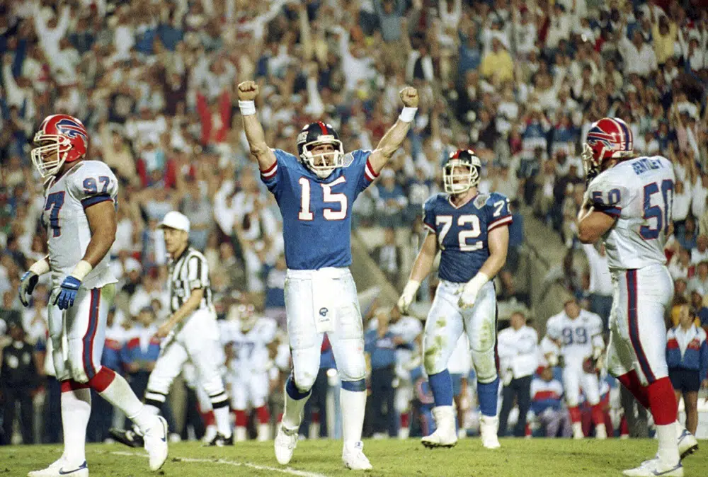 FILE - New York Giants quarterback Jeff Hostetler (15) celebrates a second quarter touchdown against the Buffalo Bills during Super Bowl XXV in Tampa, Fla., in this Jan. 27, 1991 photo. Brock Purdy's bid to join the select group of quarterbacks to go from a backup for most of the season to a Super Bowl starter got derailed when he suffered his own injury in the NFC championship game. There have been several examples of backups leading a team to the big game. (AP Photo, File)