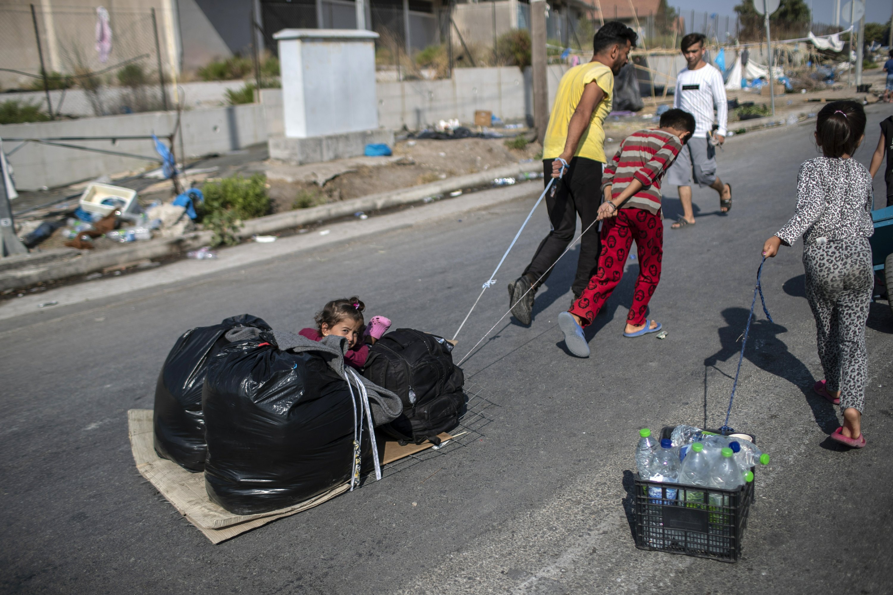 greece-police-move-more-homeless-migrants-to-new-tent-camp