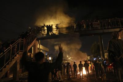 Manifestantes indígenas llegan a Quito para protestar contra las políticas económicas del gobierno del presidente Guillermo Lasso, en Quito, Ecuador, el 19 de junio de 2022. (AP Foto/Dolores Ochoa)