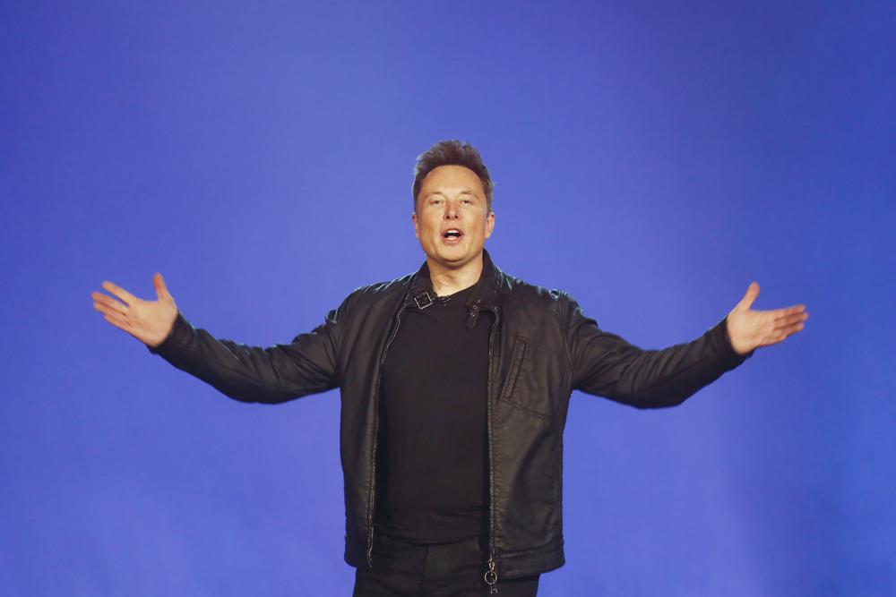 FILE - Tesla CEO Elon Musk introduces the Cybertruck at Tesla's design studio Thursday, Nov. 21, 2019, in Hawthorne, Calif. Musk has laid out some bold, if still vague, plans for transforming Twitter into a place of “maximum fun!” once he buys the social media platform for $44 billion and takes it private. (AP Photo/Ringo H.W. Chiu, File)