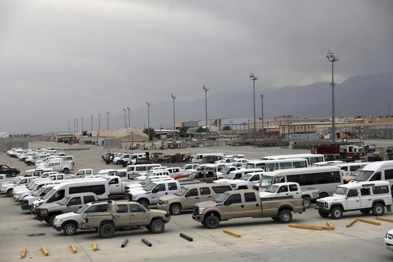 Vehicles are parked at Bagram Airfield after the American military left the base, in Parwan province north of Kabul, Afghanistan, Monday, July 5, 2021. The U.S. left Afghanistan's Bagram Airfield after nearly 20 years, winding up its "forever war," in the night, without notifying the new Afghan commander until more than two hours after they slipped away. (AP Photo/Rahmat Gul)