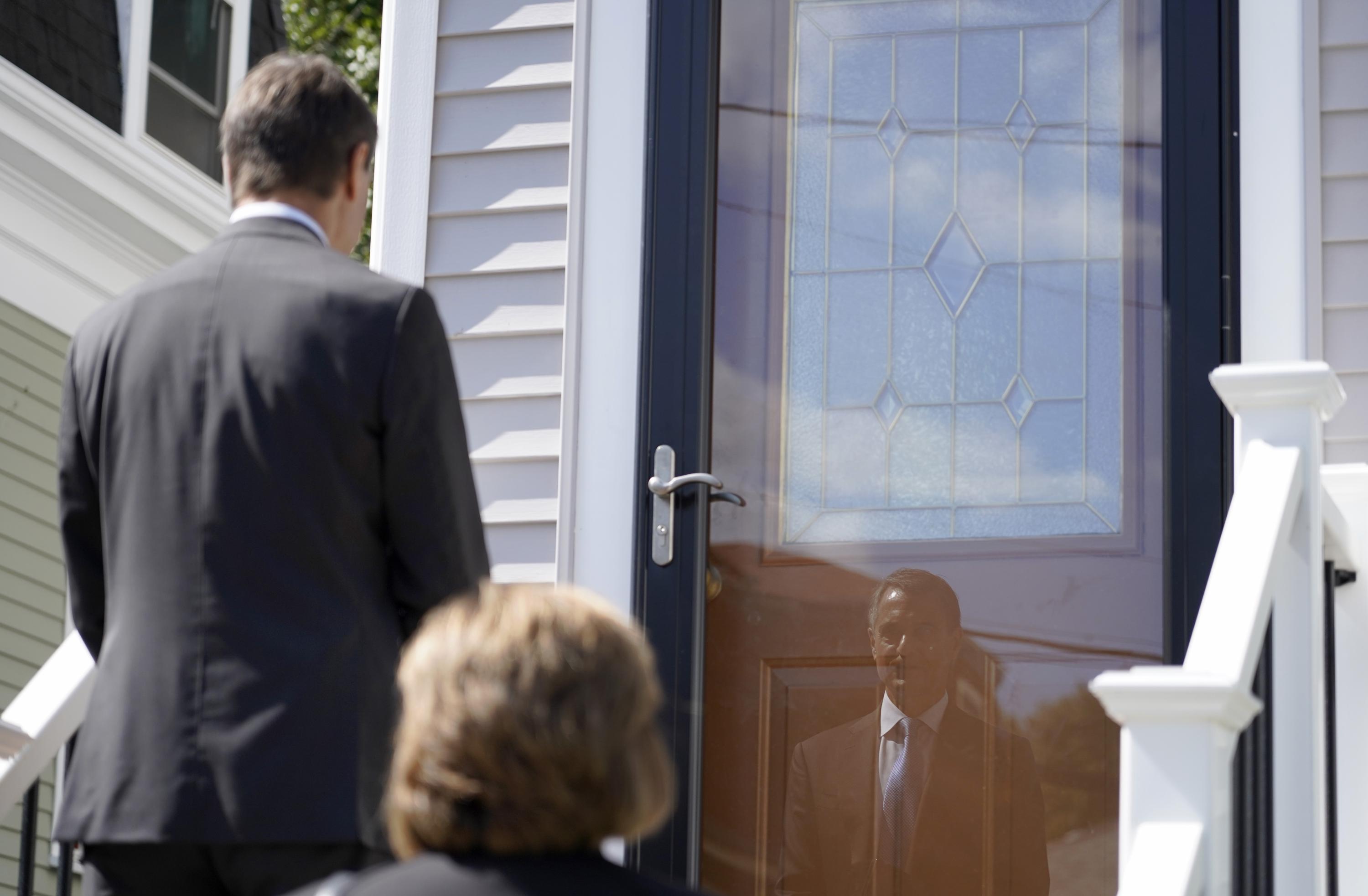 Knock, knock: Jehovah's Witnesses resume door-to-door work.