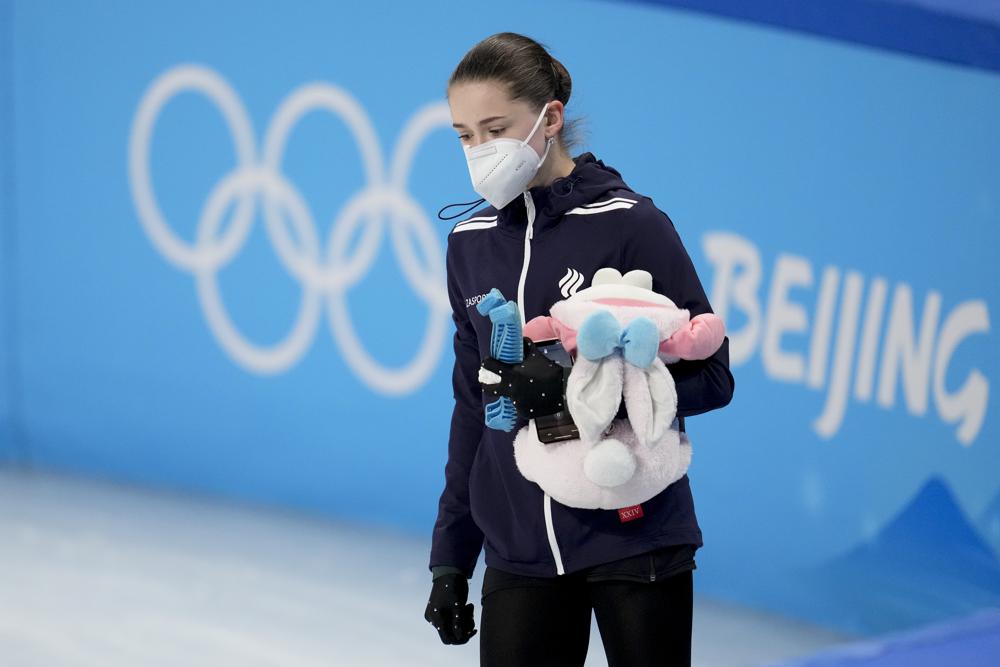 Kamila Valieva, of the Russian Olympic Committee, leaves after a training session at the 2022 Winter Olympics, Sunday, Feb. 13, 2022, in Beijing. (AP Photo/Natacha Pisarenko)