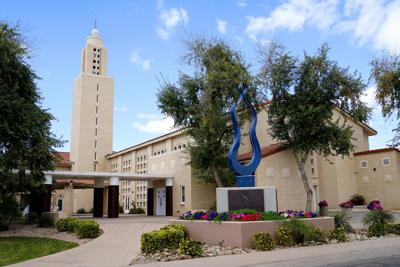 The Catholic Church said baptisms performed by priest, Rev. Andres Arango, who served in Arizona for 16 years are now presumed to be invalid because he used incorrect wording on a subtle but key component of the sacrament, including at St. Gregory Parish Wednesday, Feb. 16, 2022, in Phoenix. (AP Photo/Ross D. Franklin)