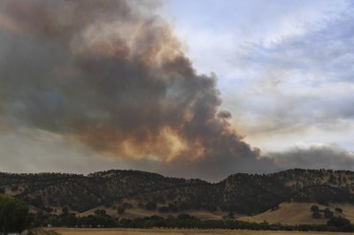 Lightning sparks new wildfires across California | AP News