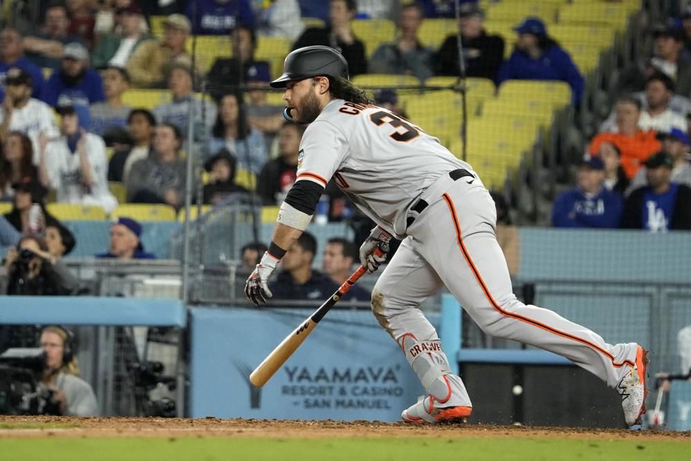 MLB巨人队以 7-5 击败道奇队