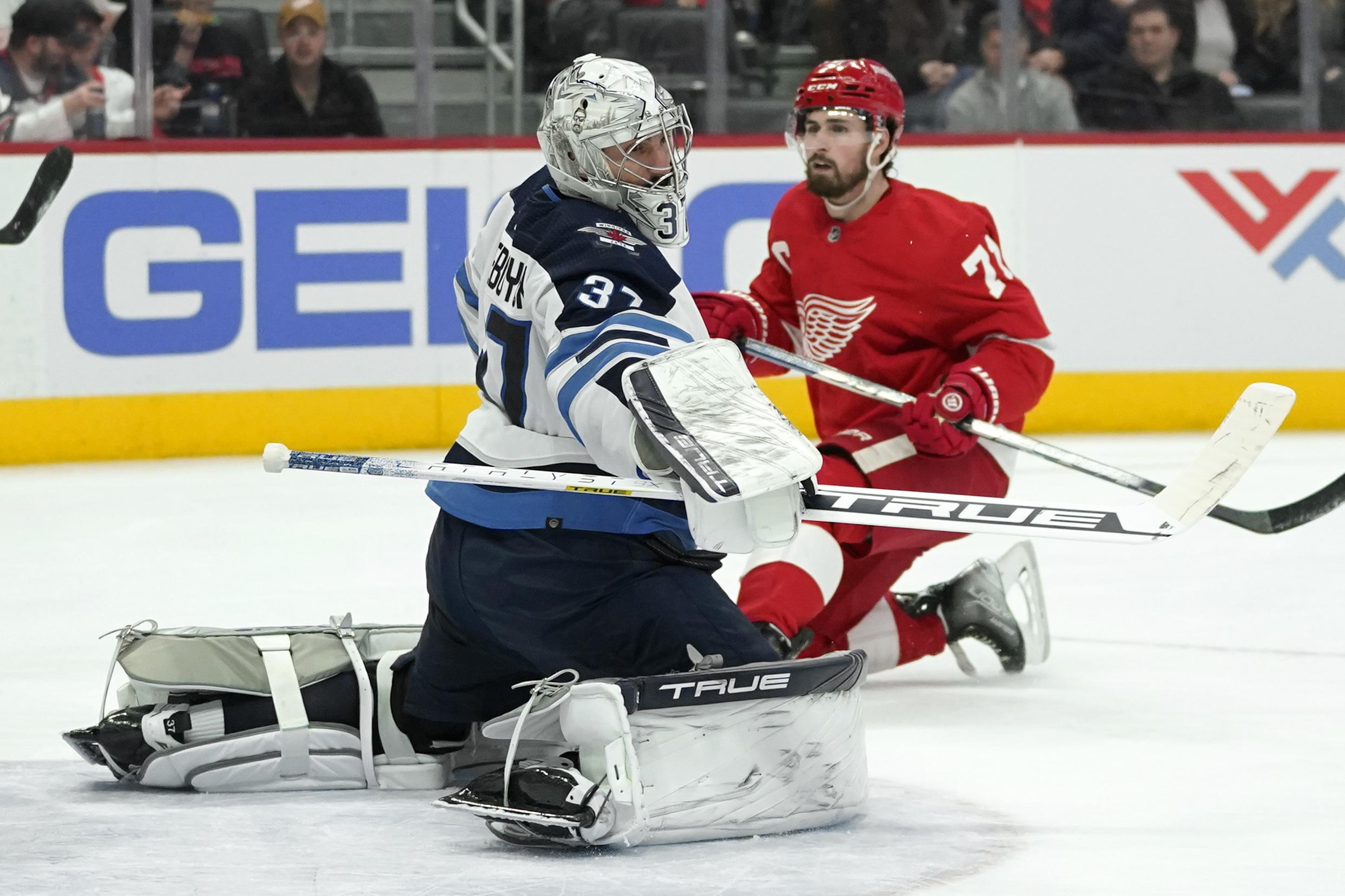 Connor Hellebuyck stops 33 shots, Jets beat Red Wings 30 AP News