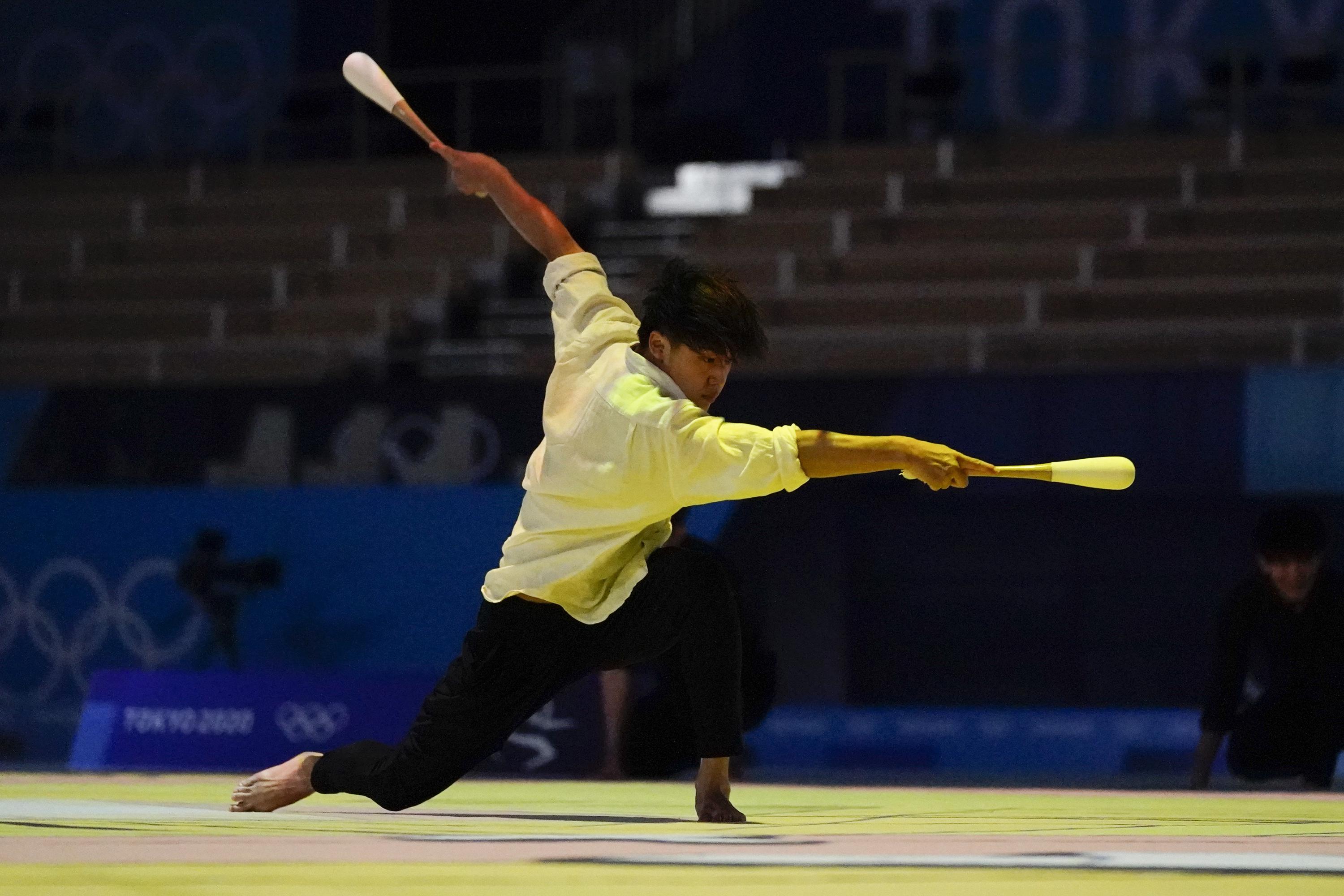 Left out of Olympics, men's rhythmic gymnasts loved in Japan