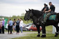 FILE -Officers on horseback guard the entrance to designated demonstrator areas near Riverbend Maximum Security Institution as people wait to enter before the scheduled execution of inmate Oscar Smith, Thursday, April 21, 2022, in Nashville, Tenn. Newly released records show at two least two people connected to a planned Tennessee execution that was abruptly put on hold April 21 knew the night before that the lethal injection drugs the state planned to use hadn’t undergone certain required testing.  Last month, Gov. Bill Lee abruptly halted inmate Oscar Smith’s execution, citing  an “oversight” in the execution process. (AP Photo/Mark Humphrey, File)