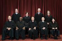 FILE - Members of the Supreme Court pose for a group photo at the Supreme Court in Washington, April 23, 2021. Seated from left are Associate Justice Samuel Alito, Associate Justice Clarence Thomas, Chief Justice John Roberts, Associate Justice Stephen Breyer and Associate Justice Sonia Sotomayor, Standing from left are Associate Justice Brett Kavanaugh, Associate Justice Elena Kagan, Associate Justice Neil Gorsuch and Associate Justice Amy Coney Barrett. (Erin Schaff/The New York Times via AP, Pool, File)