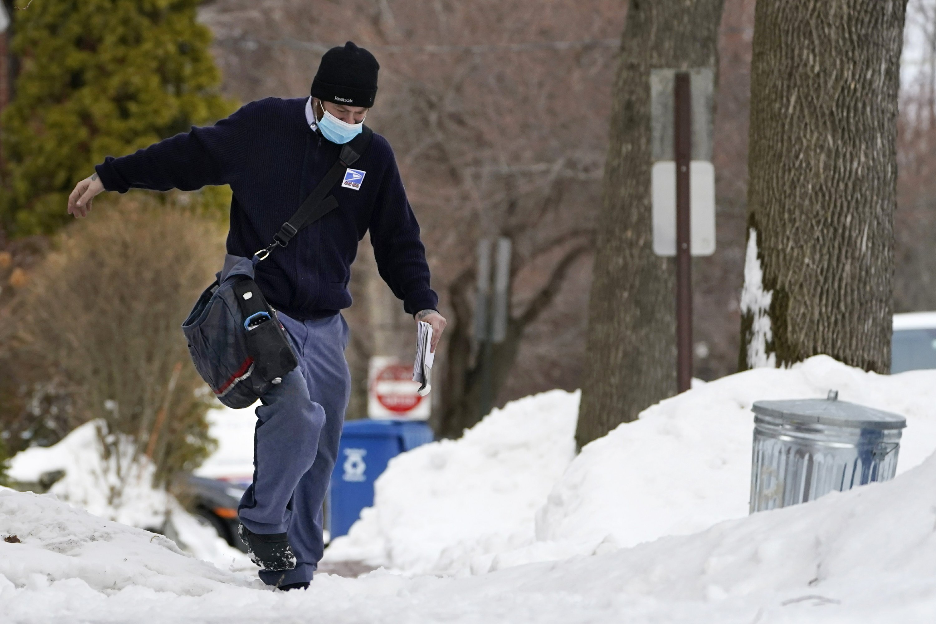 Weary postal workers hope Biden will bring new tone, change | AP News