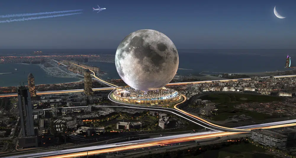 This artist rendering shows the $5 billion project, MOON envisioned on the Dubai Pearl, a coveted plot of land at the base of The Palm Jumeirah. A proposed $5 billion real estate project wants to take skyscraper-studded Dubai to new heights by bringing a part of the heavens down to Earth. Canadian entrepreneur Michael Henderson envisions building a 274-meter (900-foot) replica of the moon atop a 30-meter (100-foot) building in Dubai, already home to the world's tallest building and other architectural wonders. (Michael Henderson/Moon World Resorts via AP)