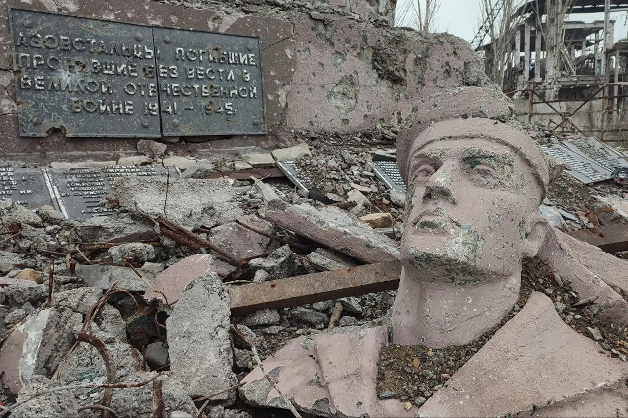 FILE - The remains of a statue and other rubble lie in front of the Azovstal steel mill, which was the last place in the Ukrainian city of Mariupol to fall to Russian forces in late May 2022. (AP Photo, File)