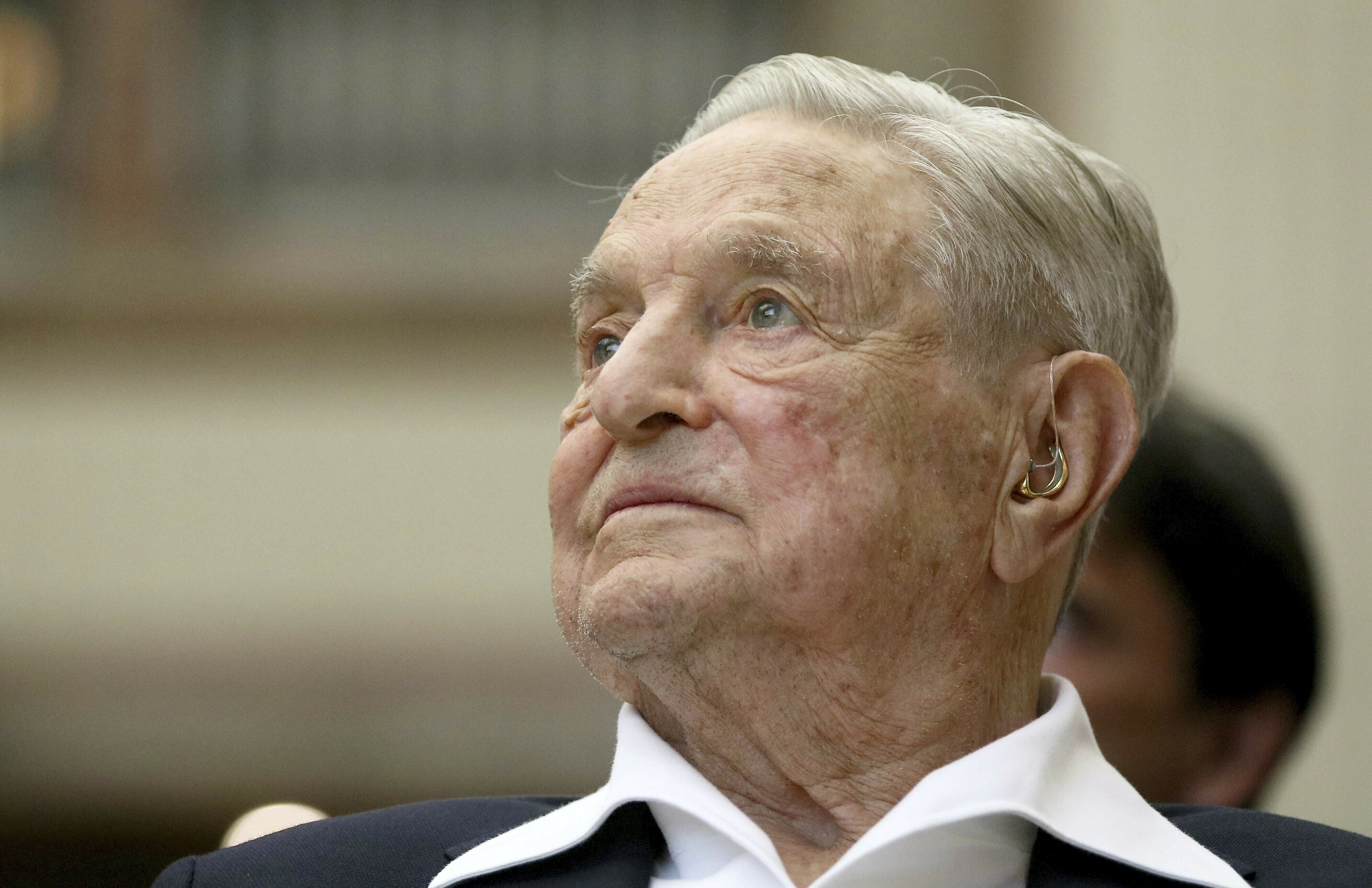 George Soros conspiracy theories surge as protests sweep US | AP News