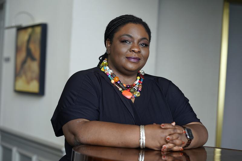 Dawn Blagrove, executive director of Emancipate NC, poses for a photo in Raleigh, N.C., Friday, June 11, 2021. North Carolina state lawmakers recently advanced a bill that would prevent 6- to 9-year-olds from having to appear before a judge for juvenile justice proceedings. This would end the state's status as being the only one left that subjects such young children to these courtroom appearances. (AP Photo/Gerry Broome)