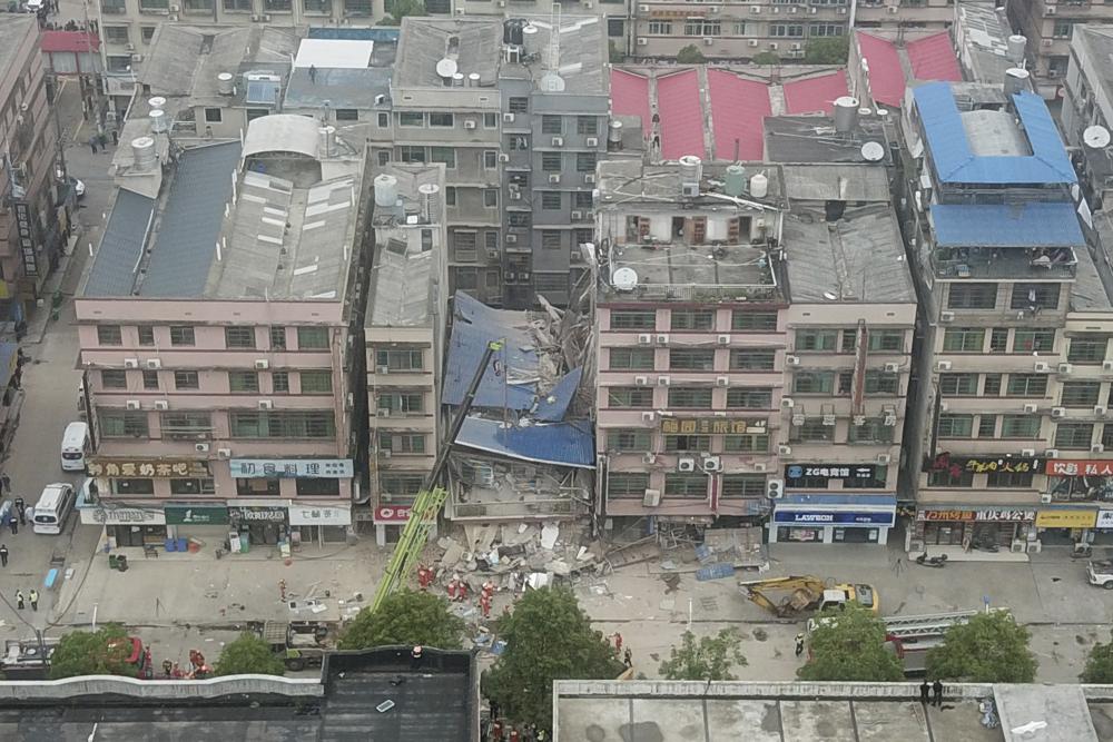 This photo released by Xinhua News Agency, shows the site of a collapsed self-constructed residential building in Changsha, central China's Hunan Province on April 29, 2022. (Chen Zeguo /Xinhua via AP)