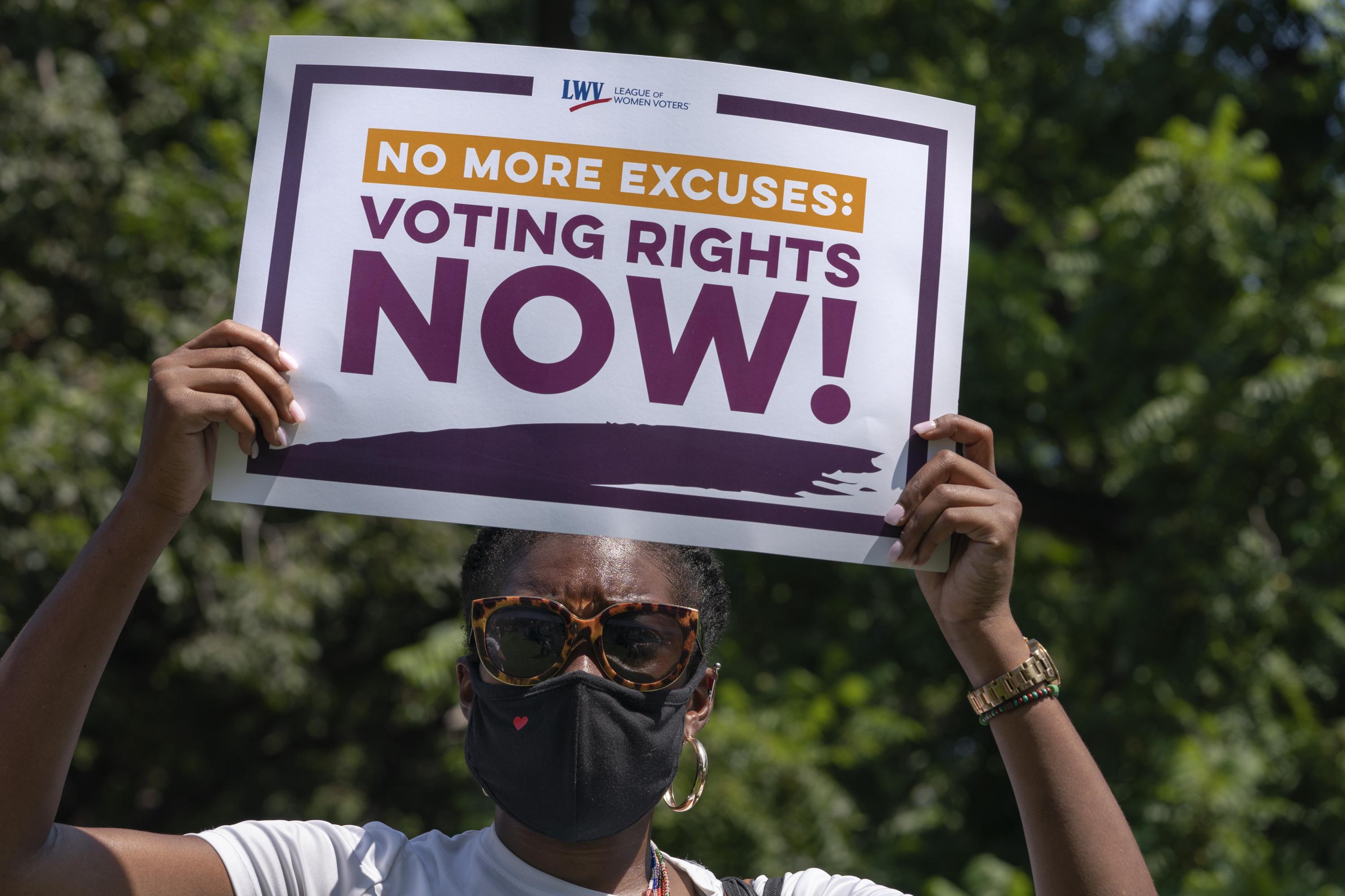 House passes bill bolstering landmark voting law | AP News