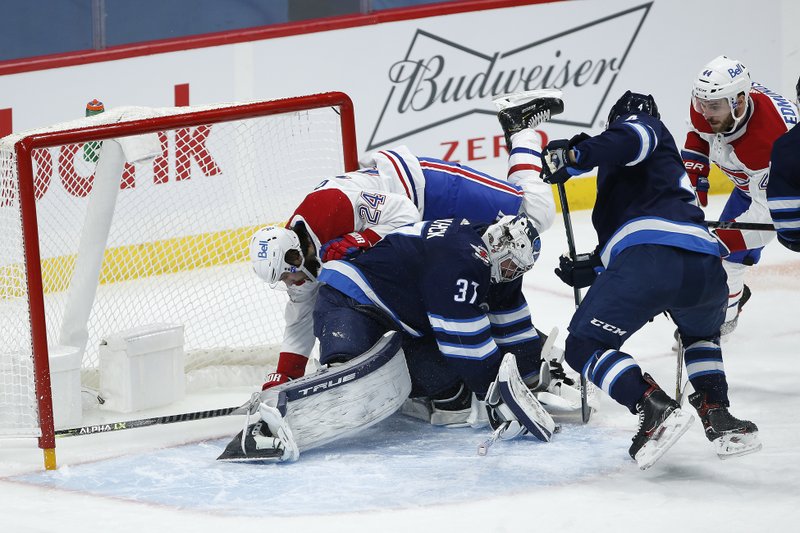 Stastny Scores In 1st Minute Of Ot Jets Beat Canadiens 2 1