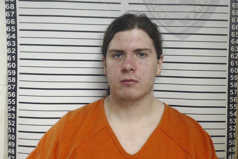 FILE - This file booking image provided by the Louisiana Office of State Fire Marshal shows Holden Matthews. Matthews, a Louisiana man who admitted to burning down three predominantly African American churches, was sentenced Monday, Nov. 2, 2020, to 25 years in prison and ordered to pay the churches $2.6 million. (Louisiana Office of State Fire Marshal via AP, File)