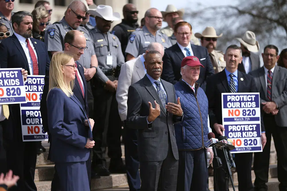 James Smith, President of the Oklahoma Association of Chiefs of Police, addresses the No on 820 rally on the south plaza of the Capitol in Oklahoma City on Monday, March 6, 2023. Oklahoma voters will decide Tuesday, March, 6, 2023, whether to make the state one of the most conservative to green light cannabis use for adults. (Doug Hoke/The Oklahoman via AP)