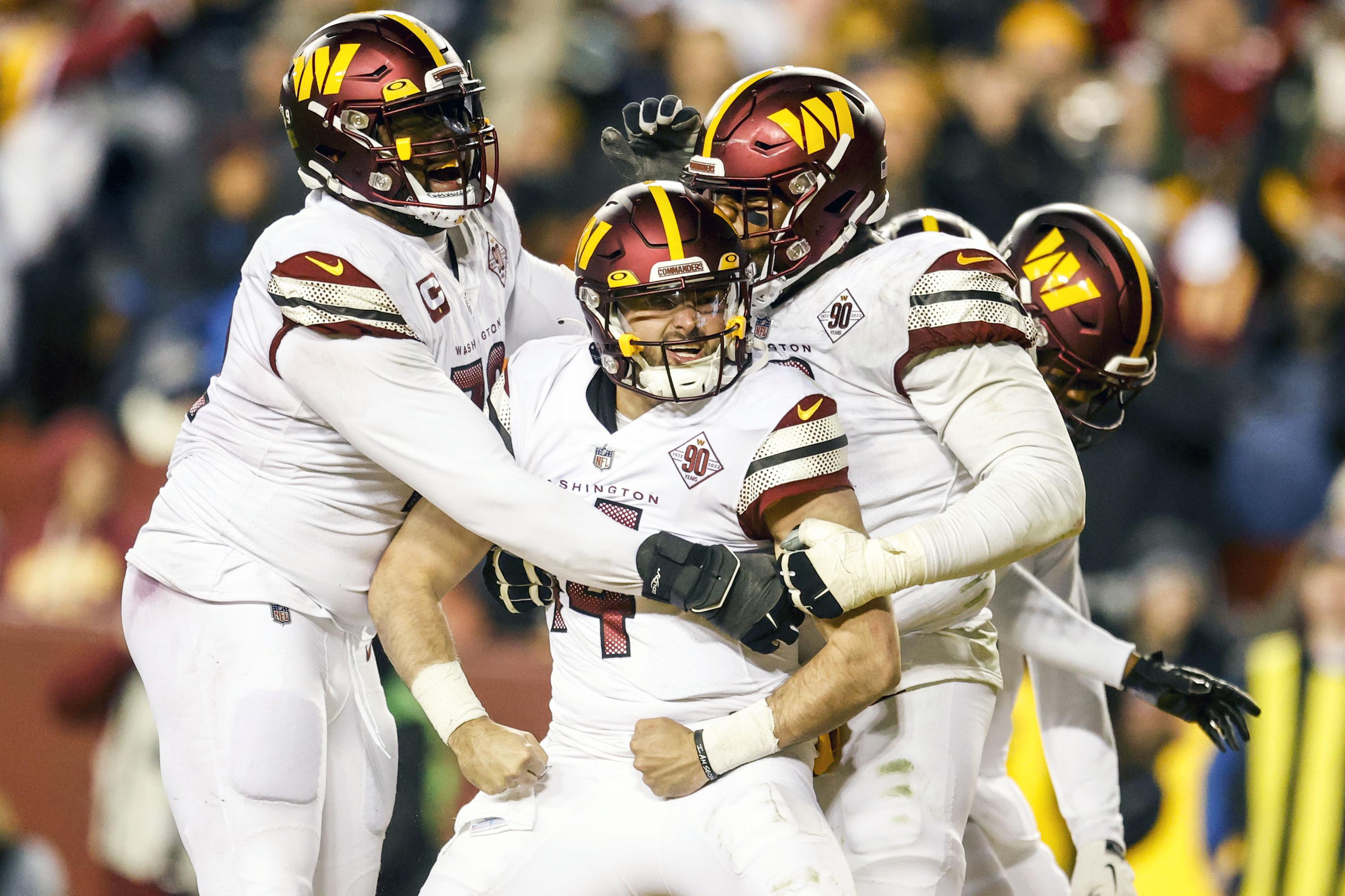 Washington Commanders tight end Armani Rogers (88) catches a pass