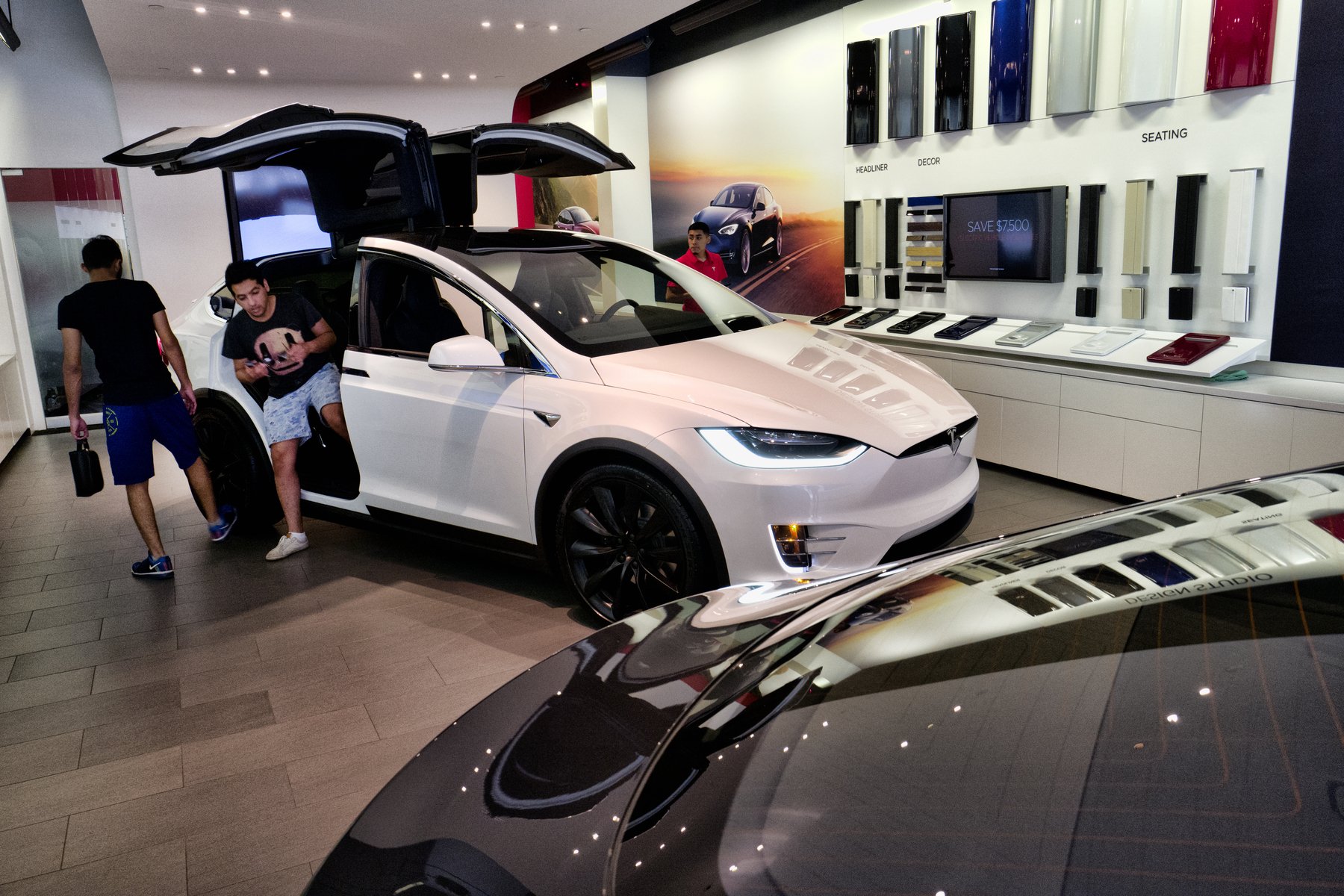 California Cuts Electric car Rebates Drops Luxury Models AP News