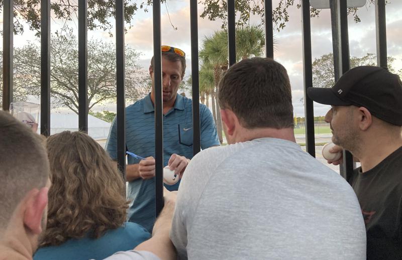 New York Mets pitcher Max Scherzer signs autographs for fans following a baseball labor negotiating session Saturday, Feb. 26 at Roger Dean Stadium in Jupiter, Fla. (AP Photo/Ron Blum)